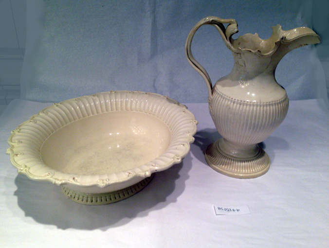 Most early Americans washed daily using water from a pitcher and basin. Ornate sets similar to the one depicted would have been found in the homes of the wealthy like Fielding and Betty Lewis.