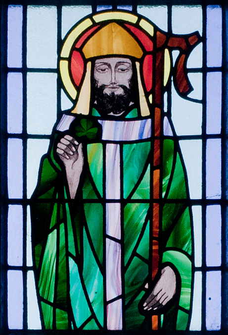Kilbennan's St. Benin's Church window depicting St. Patrick holding a shamrock